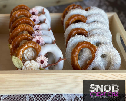 Our custom coconut can be used as a topping on a variety of different foods and treats. Picture is chocolate covered pretzels topped with our extra fine coconut shavings.  